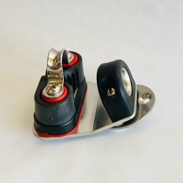 Harken Swivel with Carbo Cam Bullseye
Murrays Part# 25-3010
Swivel cam cleats are ideal for main traveler control and up-release jib cleating systems. Cam cleats and fairleads should be selected on the basis of need. Order plastic base pads and flat head screws separately to mount to your front crossbar.