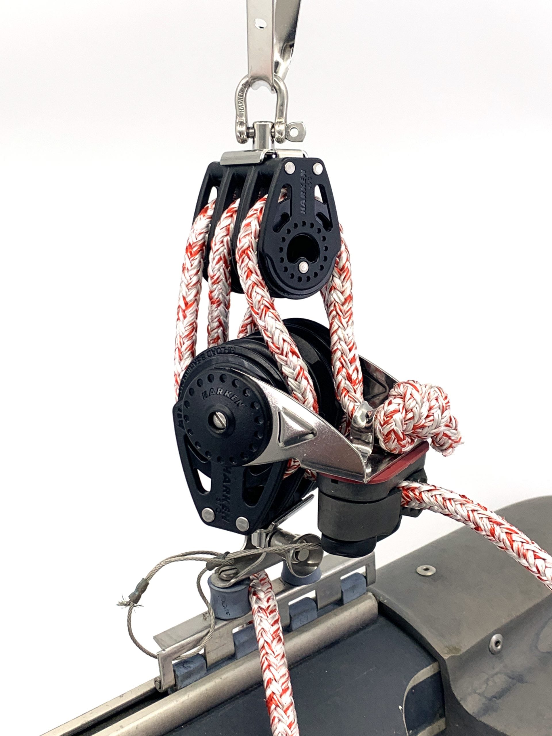 Harken H16 Race 6:1 Main Sheet System
Murrays Part# 28-61p
The 6:1 Race Mainsheet System is a low profile mainsheet system is super light weight and allows for maximum mast rake.
The base block is the 57mm Harken Carbo Ratchamatic from our regular 6:1 system with a 40mm carbo triple on the top. The Harken 57mm base block has a load sensing ratcheting system to help hold the line when it is under tension.
