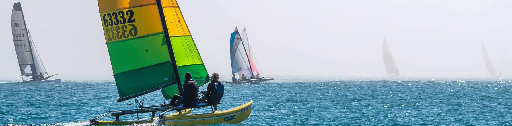 All Hobie 16 parts: Sails, trampolines, jibs, lines, rigging, rudder parts.