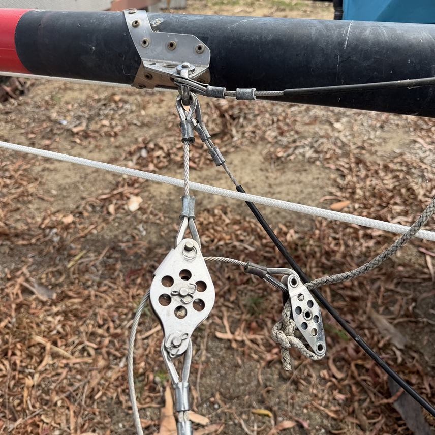 Wire jib halyard block for the Hobie 16 and 18. It features a metal sheave with a 1-1/2" diameter. This is also an upgrade for boats with jib halyard blocks that have a diameter smaller than 1-1/2".

This is a stock item for the Hobie 16 forestay/jib halyard assembly up until 2009. It connects between the upper and lower forestay and the wire portion of the jib halyard runs thru it.&nbsp;

Hobie Part# 20240001