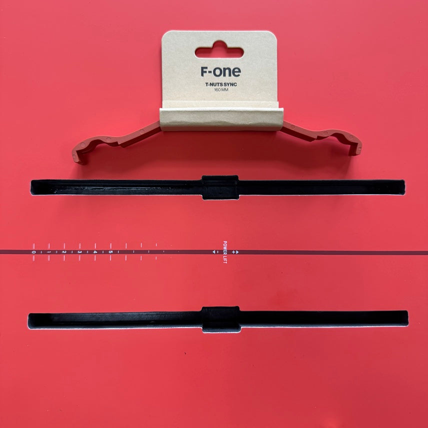 The t-nut sync bracket keeps your t-nuts in place when you are setting up so it is faster and easier to align your insets and attach your foil.

The spacing of the t-nuts is 160mm, making it compatible with all generations of F-One foils and most foils out there.